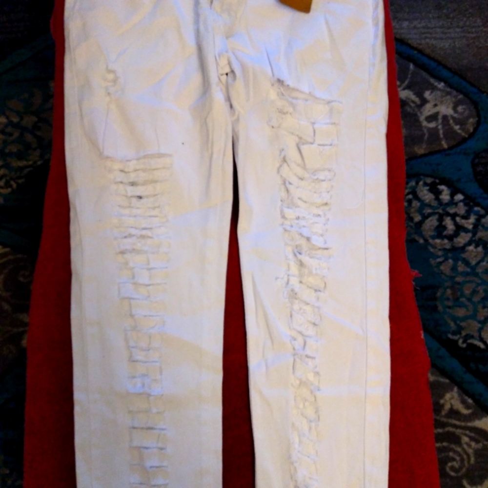 White ripped pants